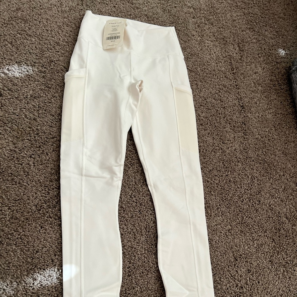 White Fabletics leggings with pockets